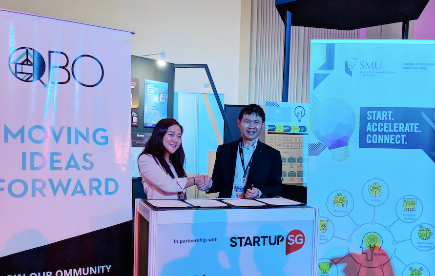 Ms Katrina Chan, Director of QBO (left) and Mr Hau Koh Foo, Director of IIE (right) at MOU signing at SWITCH Singapore 2018